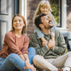 A family sitting on their porch