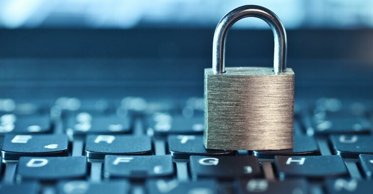 Padlock resting on a keyboard.