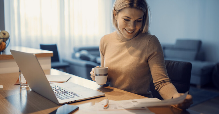 A woman using her laptop.